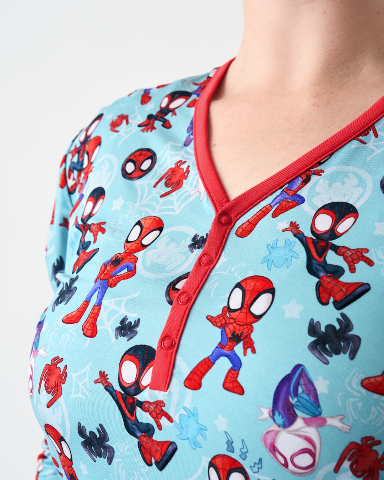 Close up of the henley button detail on the Spidey & Friends Tiny Webs Women's Long Sleeve Pajama Top