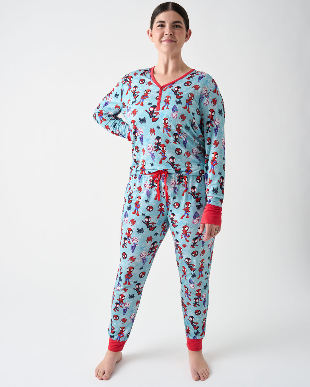 Woman wearing the Spidey & Friends Tiny Webs Women's Long Sleeve Pajama Top and Pants