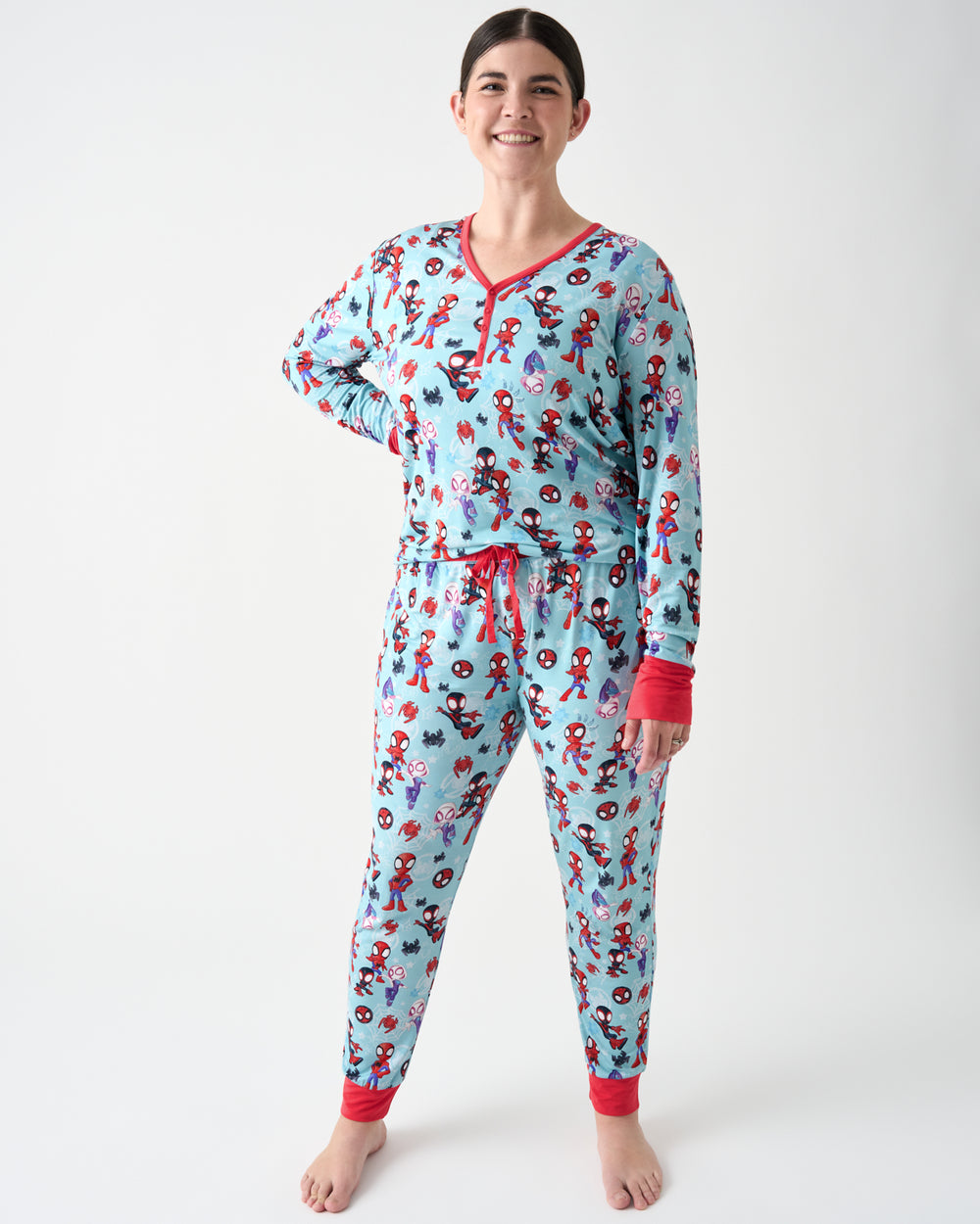 Woman wearing the Spidey & Friends Tiny Webs Women's Pajama Pants and Shirt