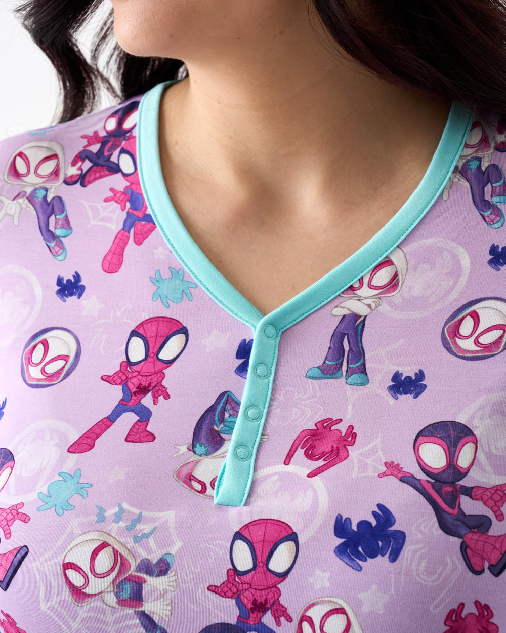 Close up of the henley button detail on the Spidey & Friends Tiny Webs Women's Long Sleeve Pajama Top