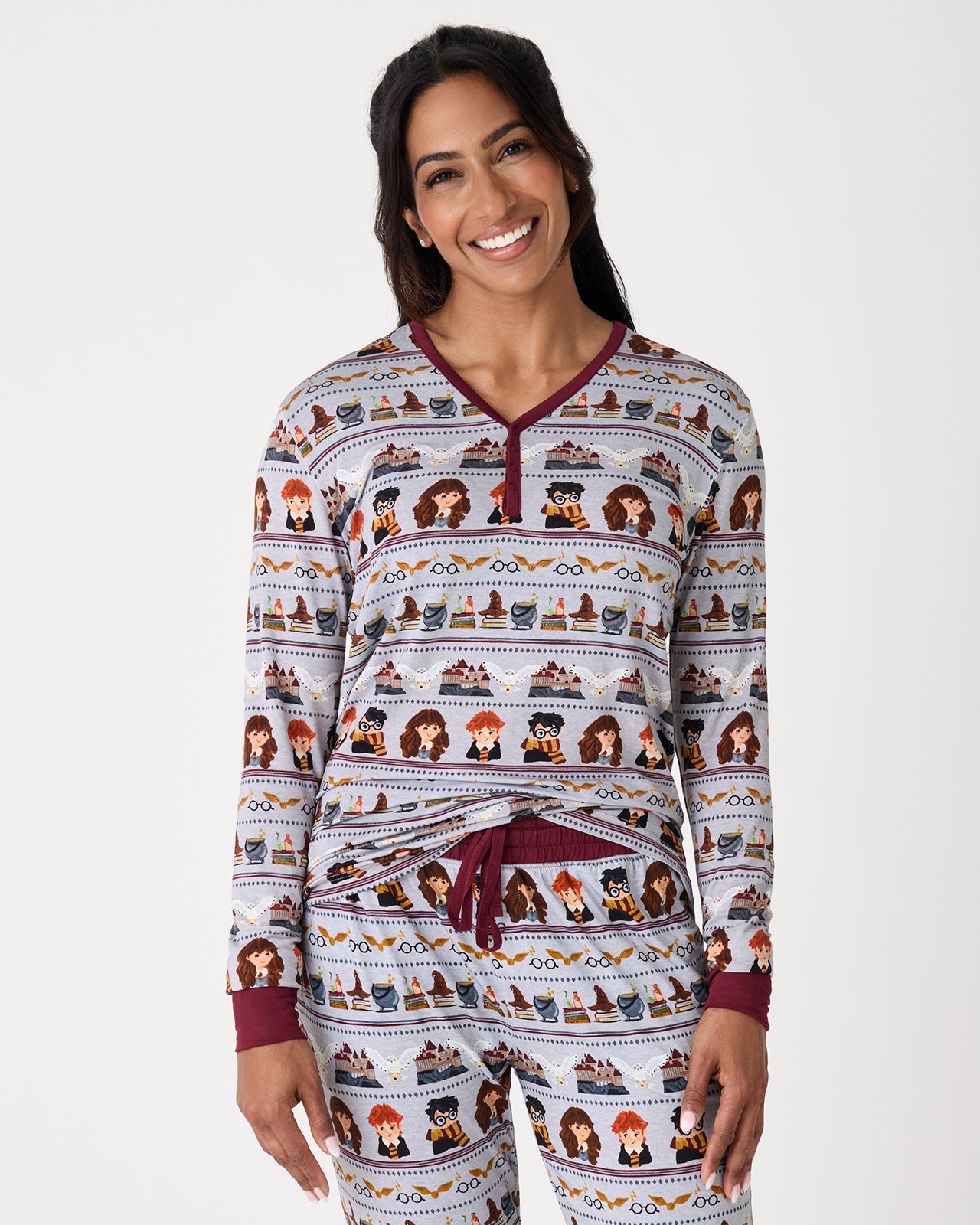 Woman wearing the Harry Potter™ Spellbinding Studies Women's Long Sleeve Pajama Top