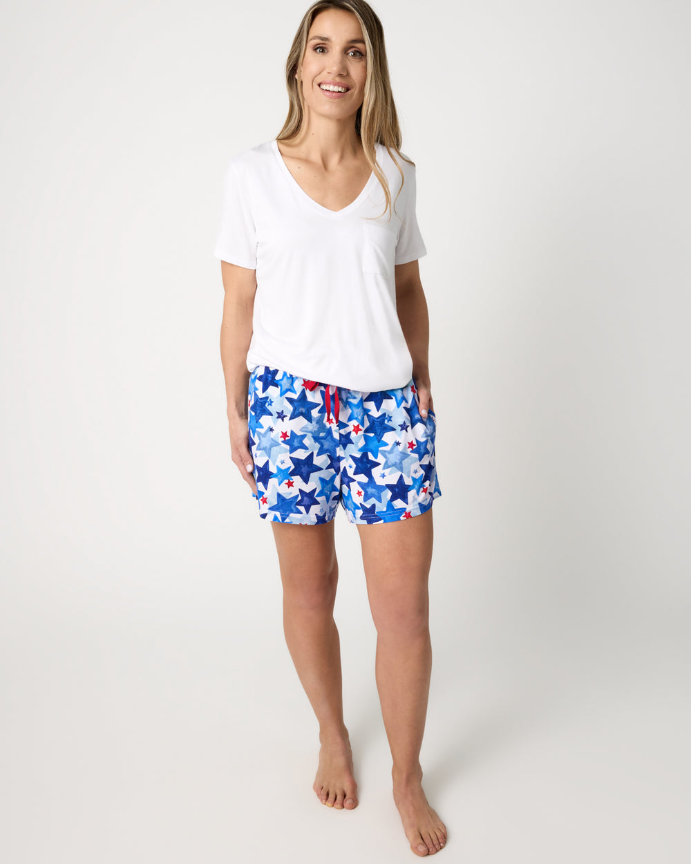 Woman wearing the Starry Splash Women's Pajama Shorts