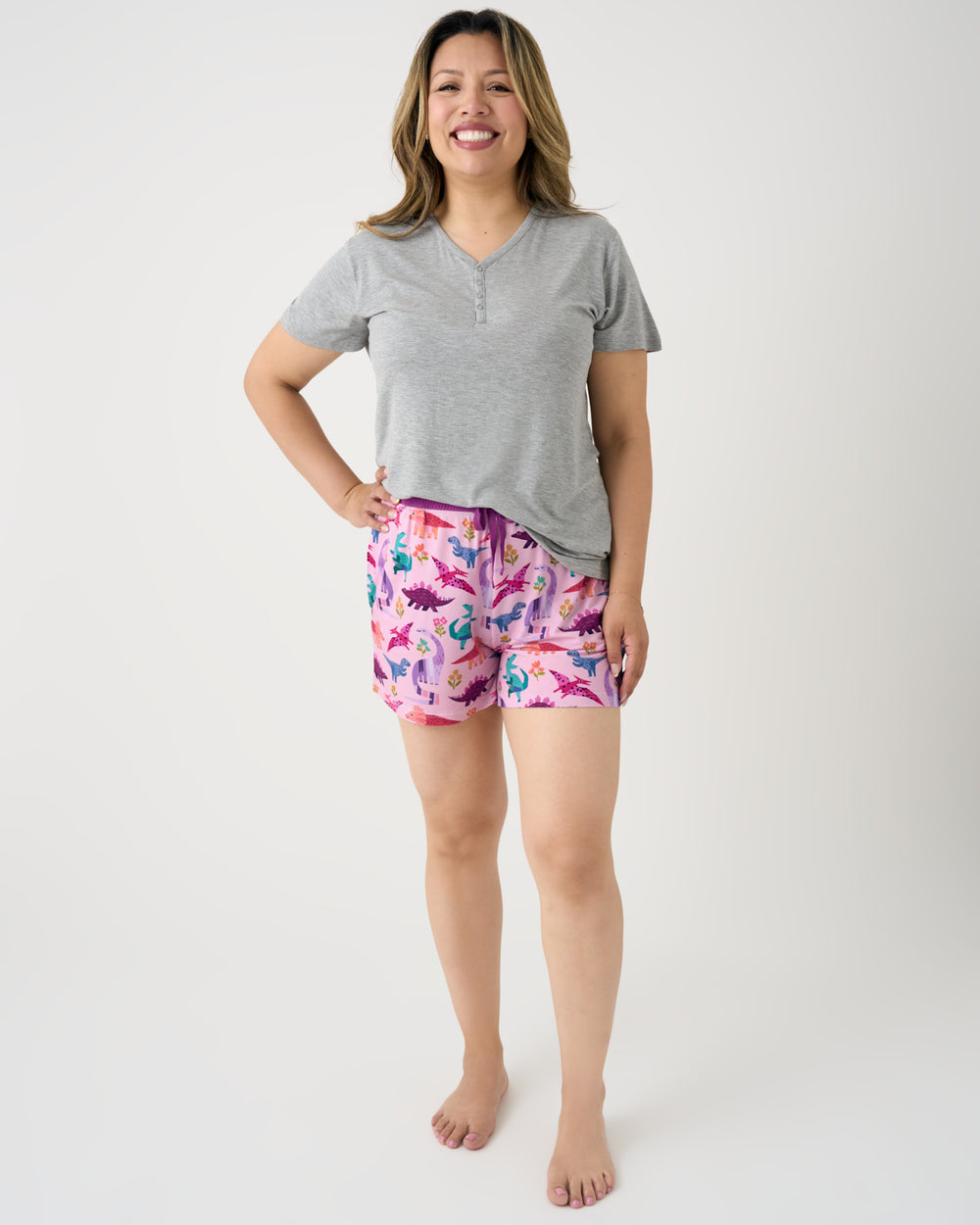 Woman wearing the Pink Roar & Explore Women's Pajama Shorts with a gray top