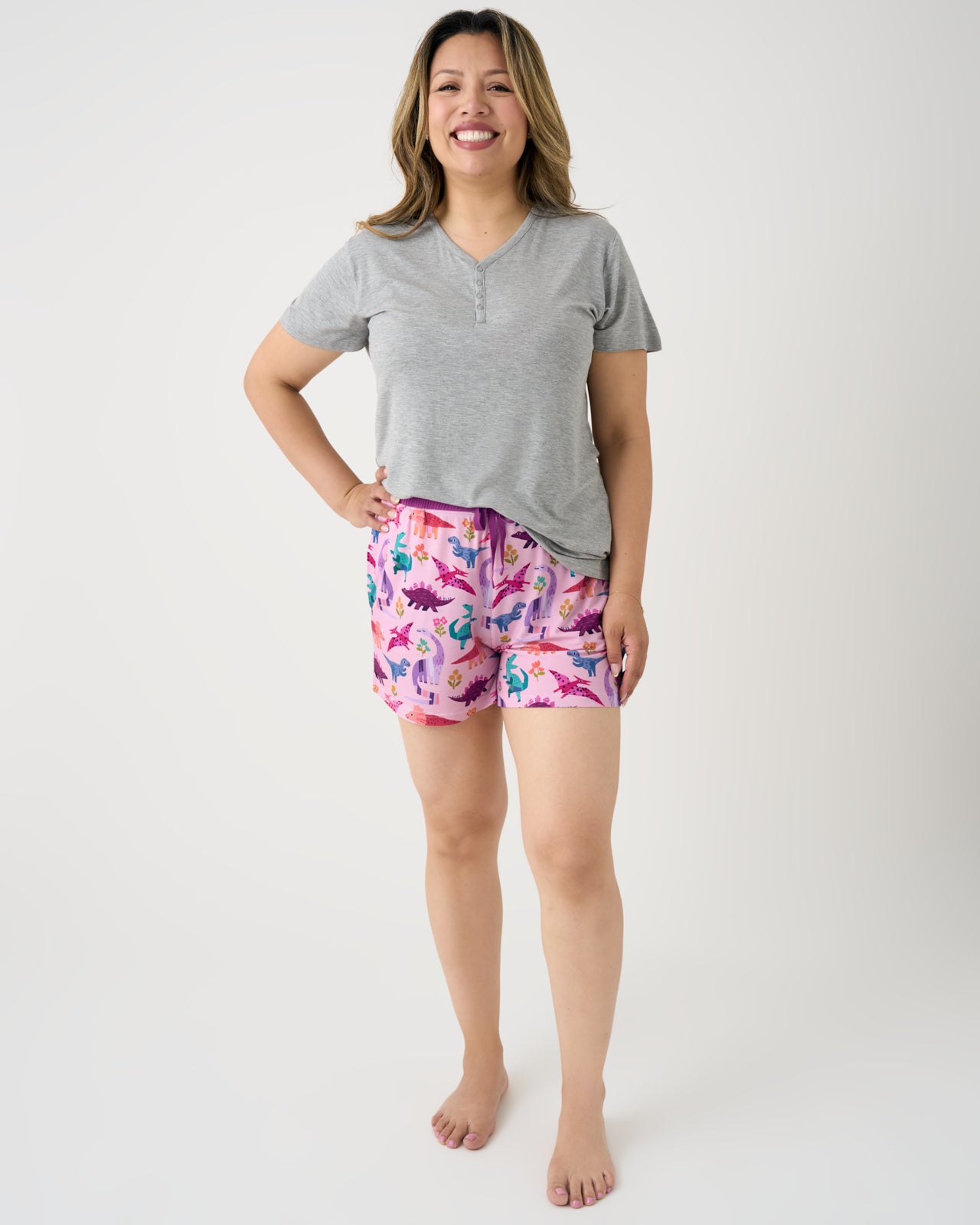 Woman wearing the Pink Roar & Explore Women's Pajama Shorts with a gray top