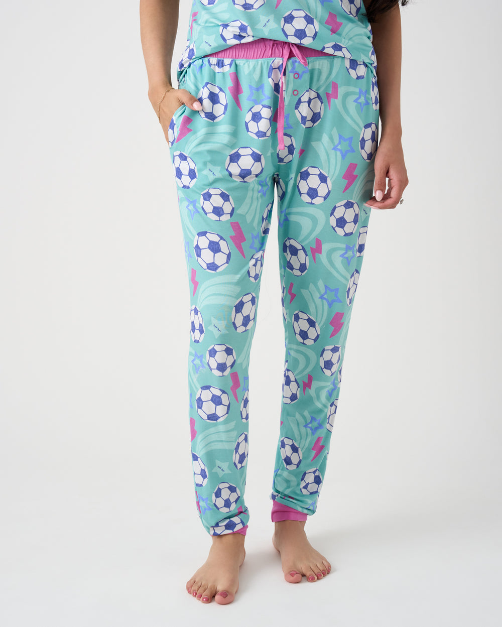 Woman wearing the Aqua Soccer Stars Women's Pajama Pants