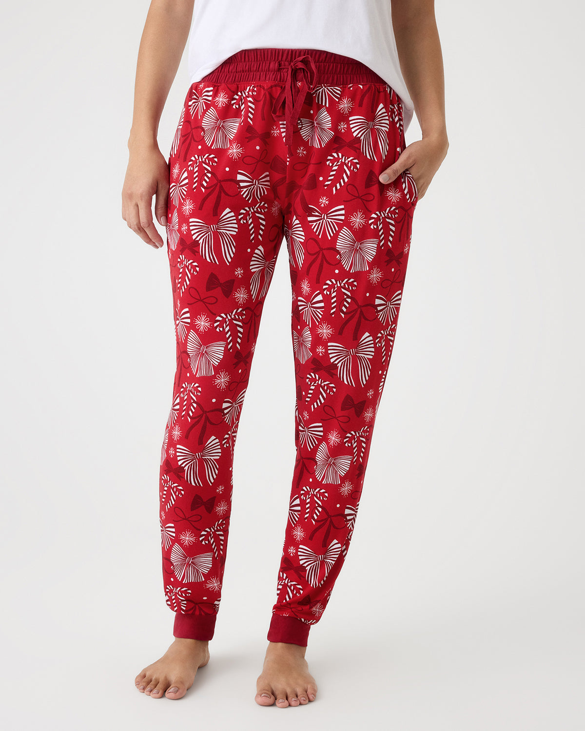 Woman wearing the Holiday Bows Women's Pajama Pants