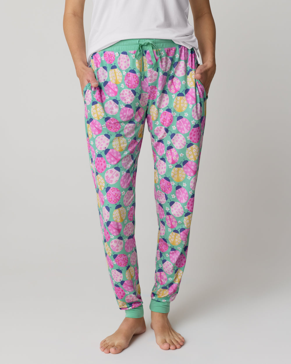 Front view of woman wearing the Ladybug Meadow Women's Pajama Pants
