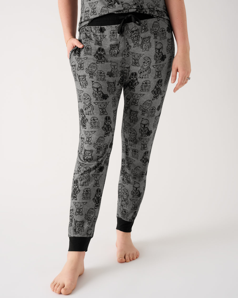 Woman wearing the Star Wars Far, Far, Away Friends Women's Pajama Pants