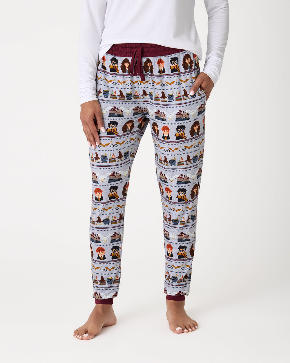 Woman wearing the Harry Potter™ Spellbinding Studies Women's Pajama Pants