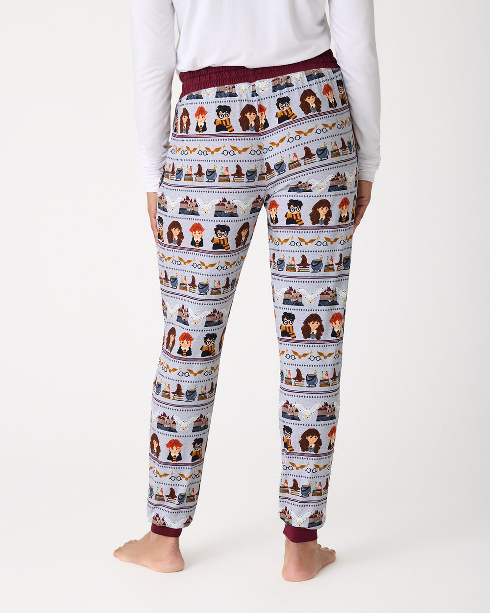 Back view of woman wearing the Harry Potter™ Spellbinding Studies Women's Pajama Pants