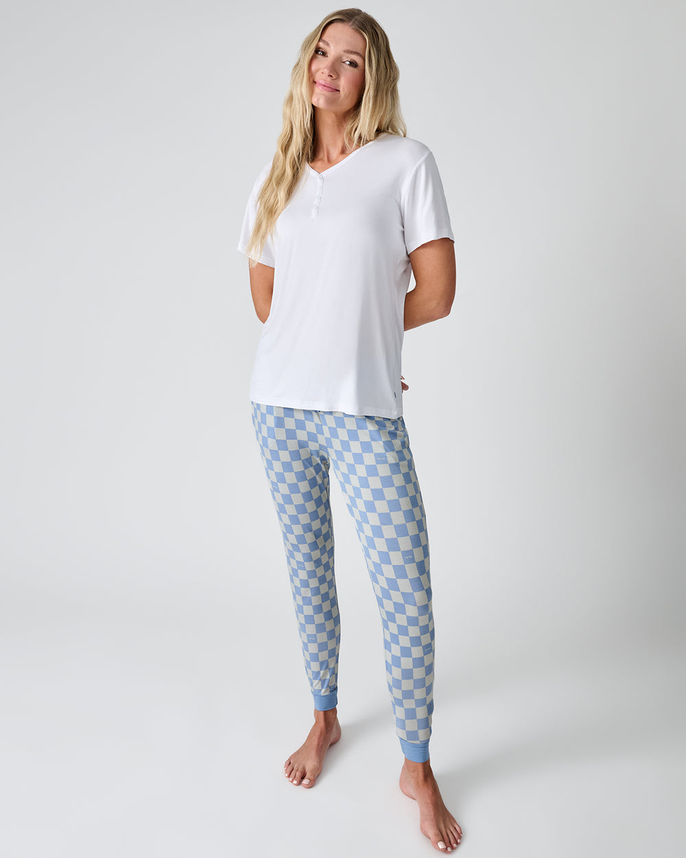 Woman wearing the Dusk Blue Checks Women's Pajama Pants with a white shirt