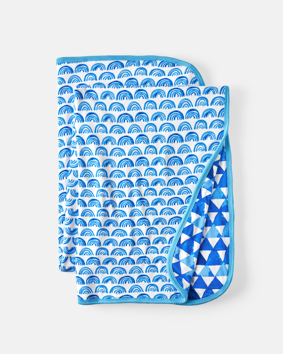 Flat lay of the Blue Rainbows Large Cloud Blanket®