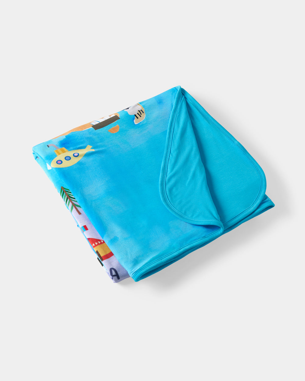 Flat lay of the Around The World Large Cloud Blanket®