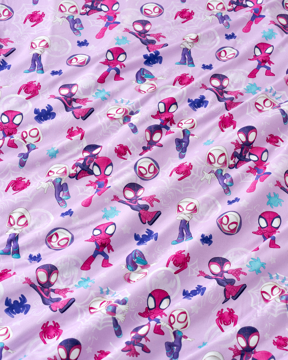 Close up of the Purple Spidey & Friends Tiny Webs fabric