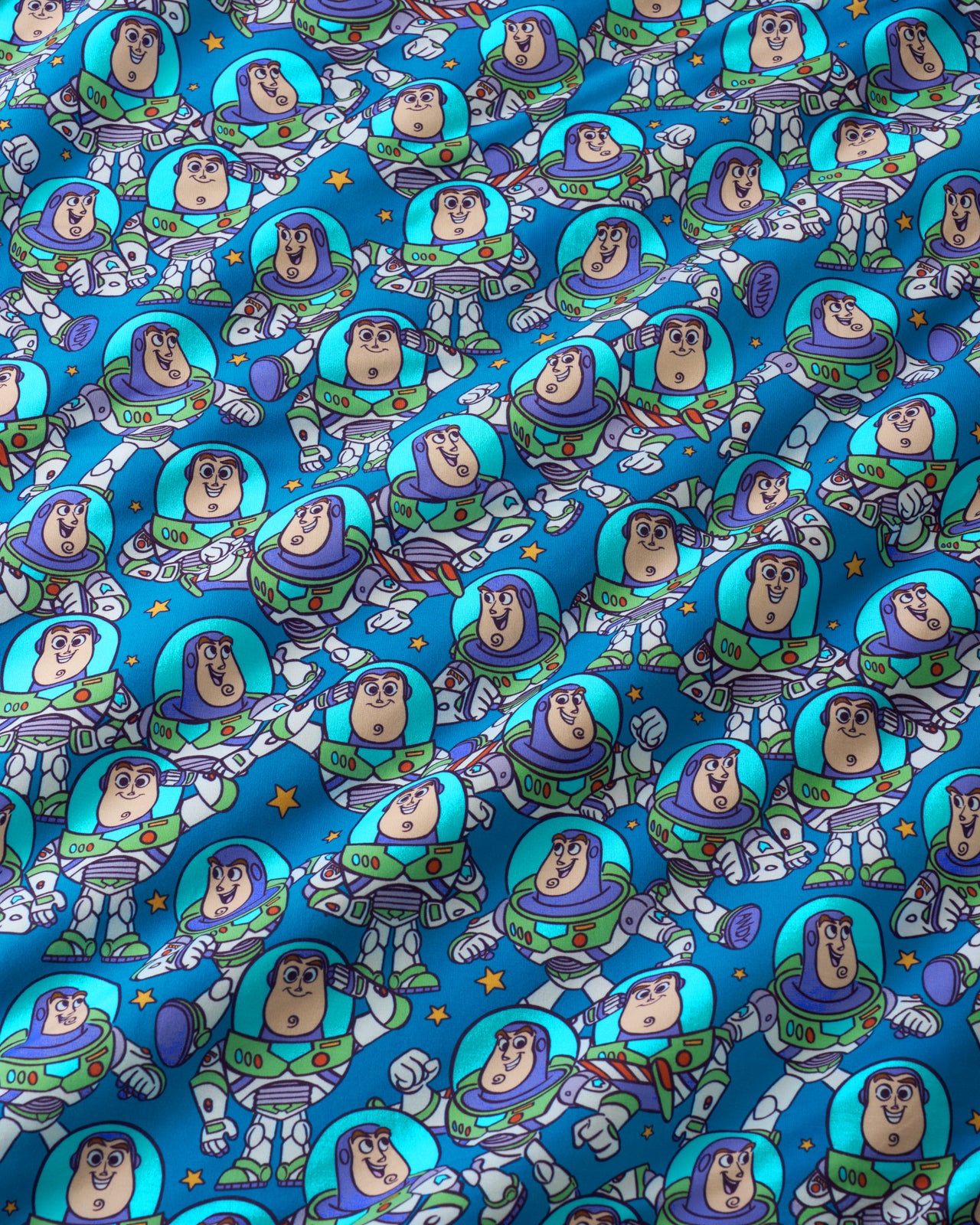 Close up of the Disney & Pixar Buzz's Cosmic Crew fabric