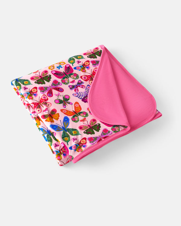 Flat lay of the Flutter Garden Large Cloud Blanket®