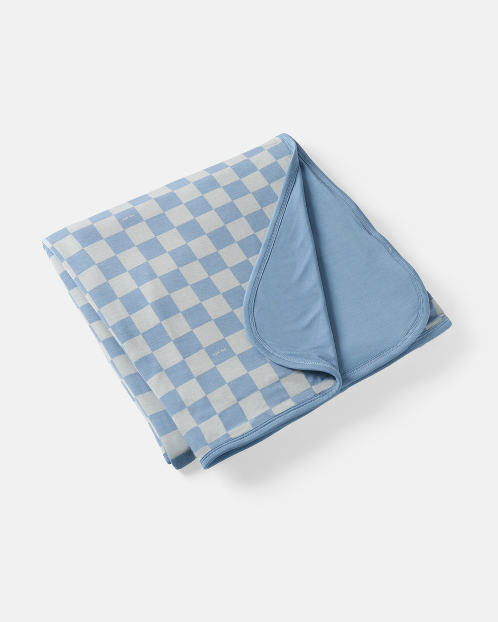 Flat lay of the Dusk Blue Checks Large Cloud Blanket®