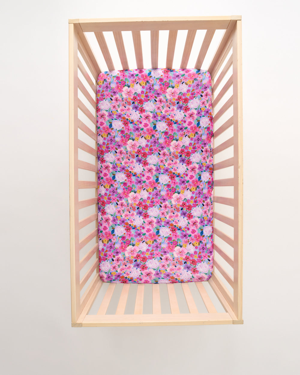 Overhead view of the Sweet Sprigs Fitted Crib Sheet