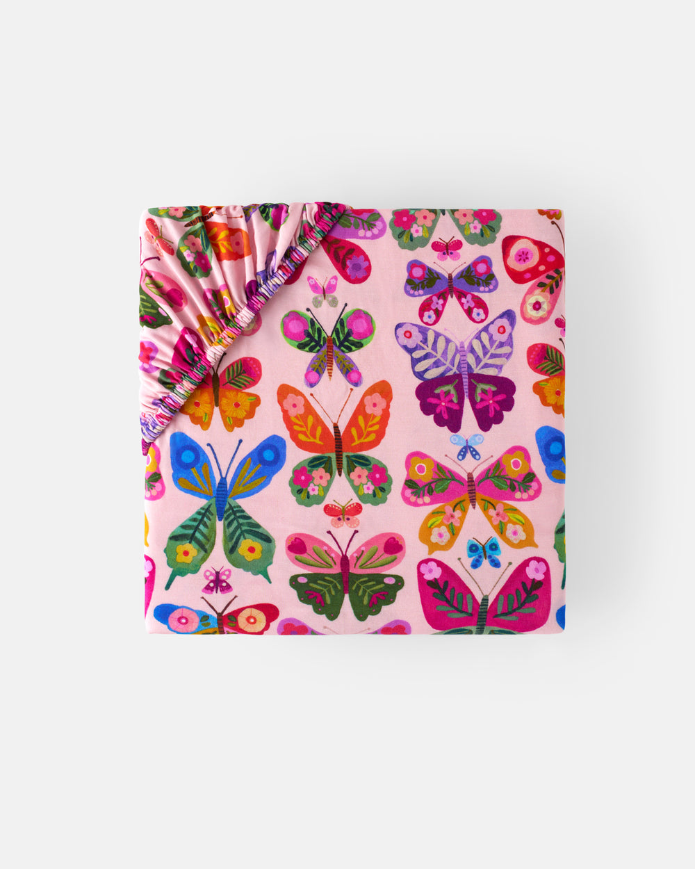 Flat lay of the mini Flutter Garden Fitted Crib Sheet