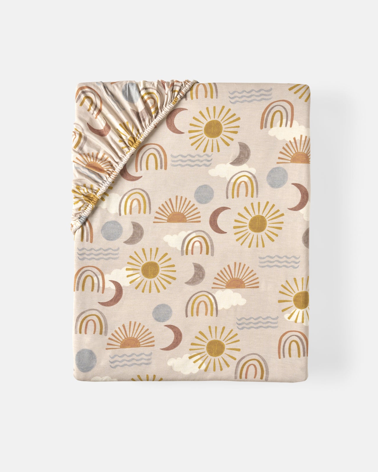 Flat lay of the Desert Sunrise Fitted Crib Sheet