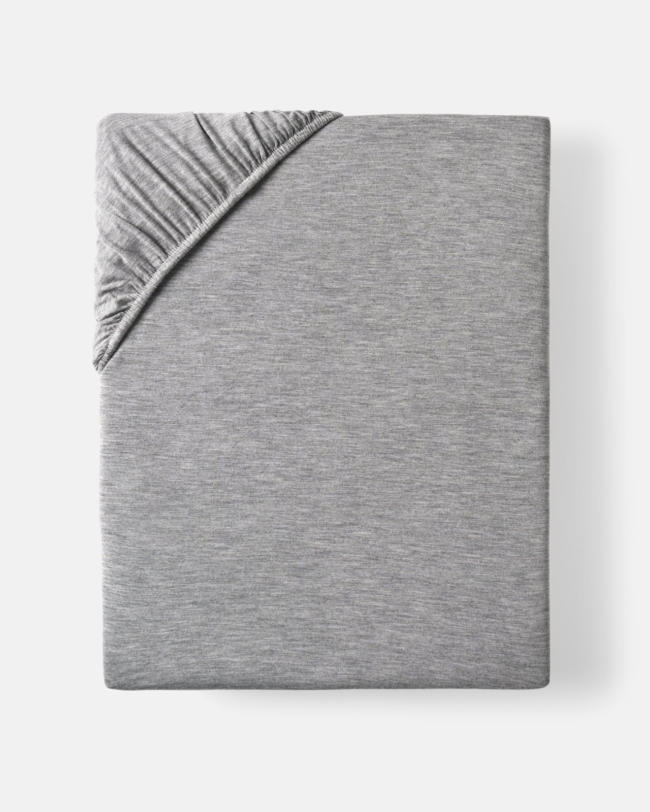Flat lay of the Heather Gray Fitted Crib Sheet