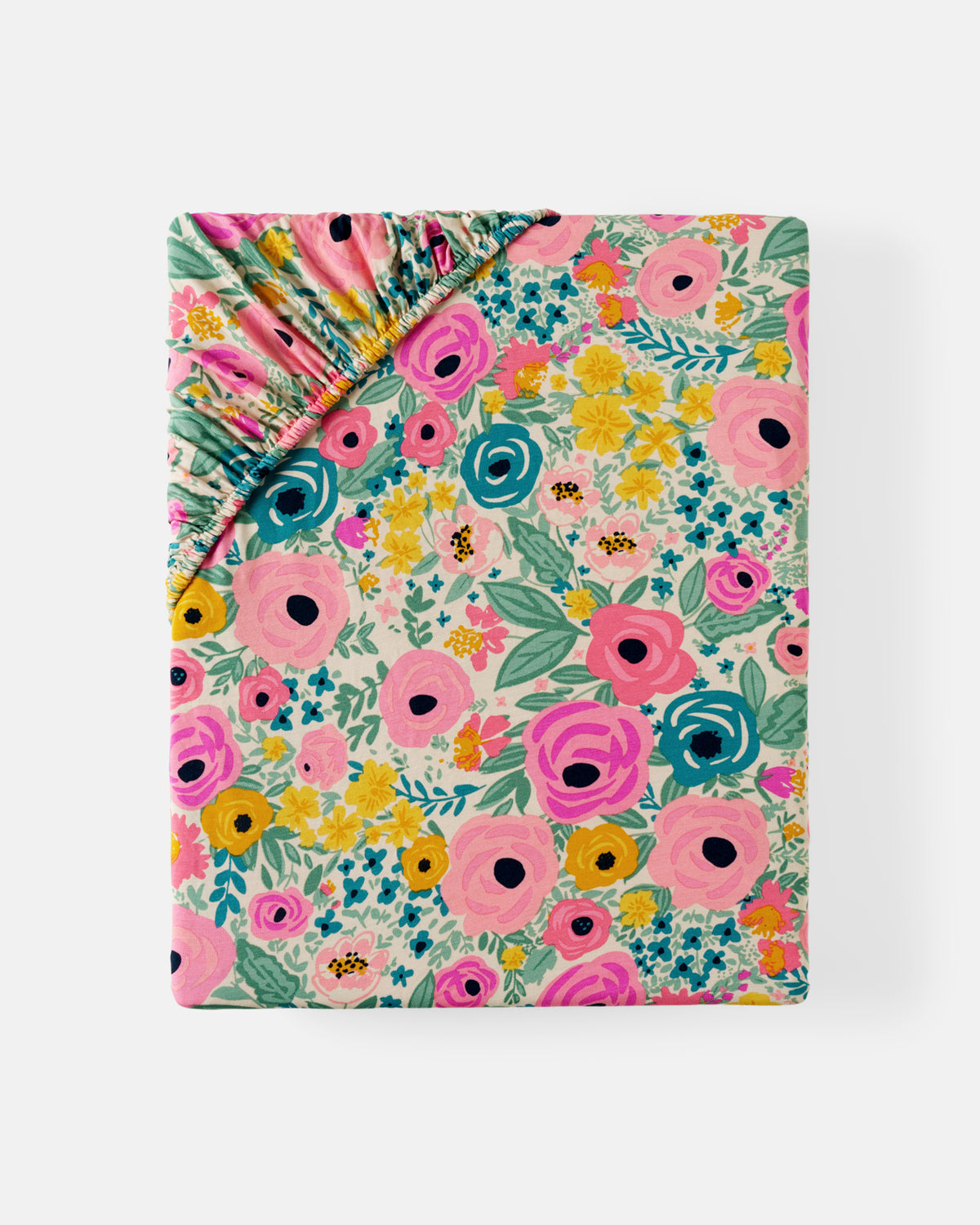 Flat lay of the Secret Garden Fitted Crib Sheet