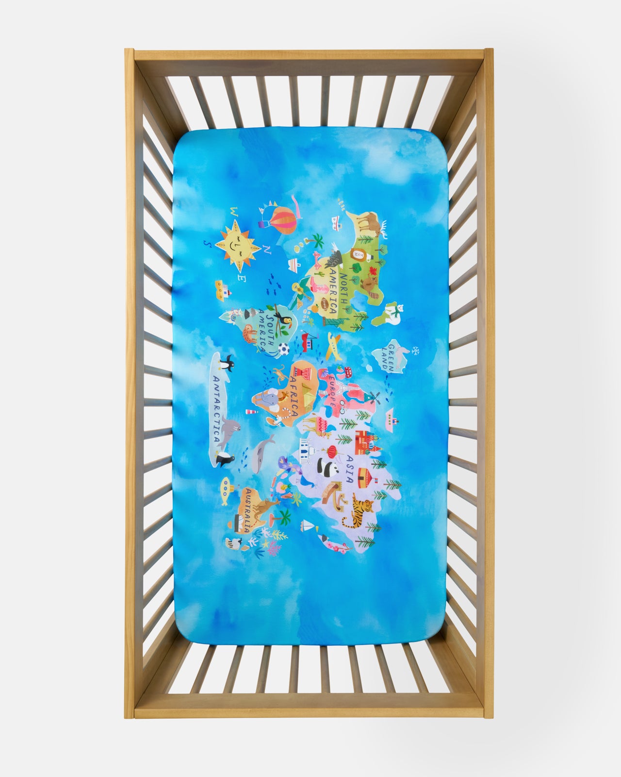 Aerial view of the Around The World Fitted Crib Sheet