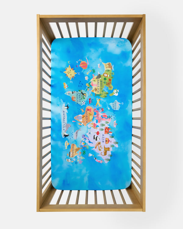 Aerial view of the Around The World Fitted Crib Sheet