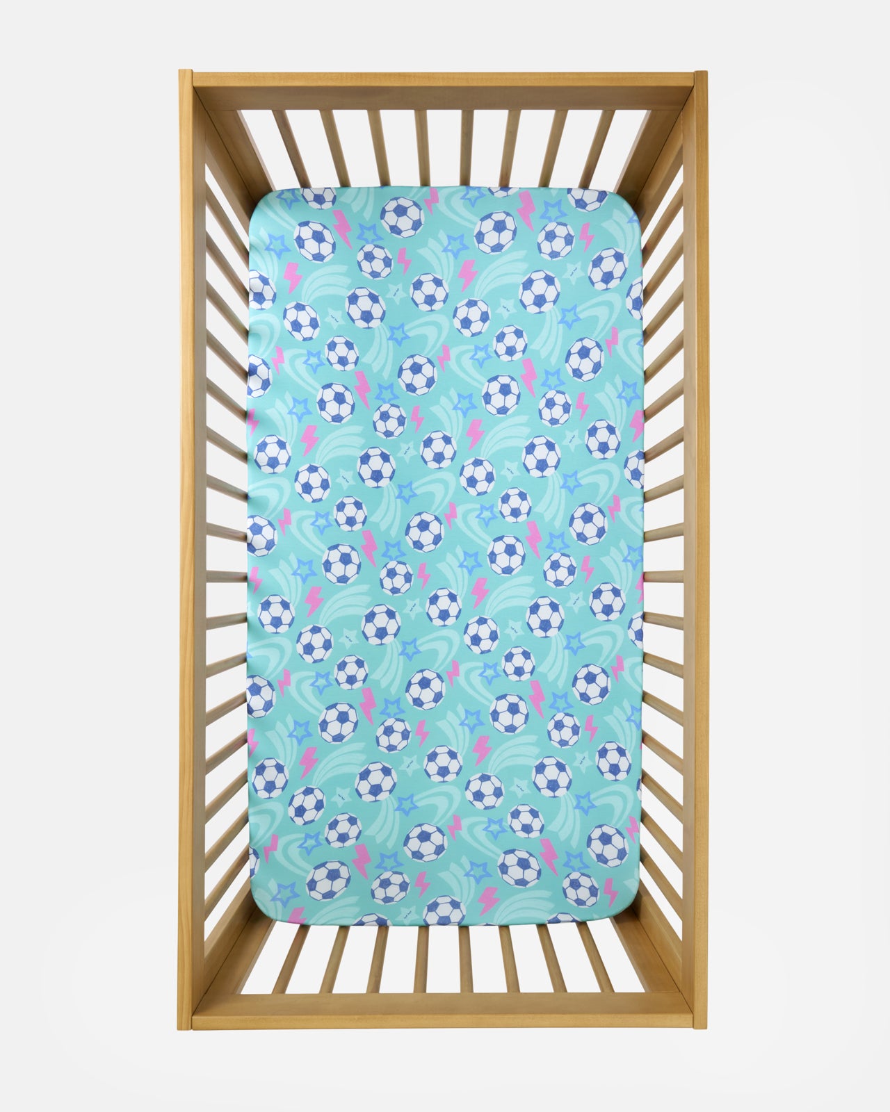 Flat lay of the Aqua Soccer Stars Fitted Crib Sheet