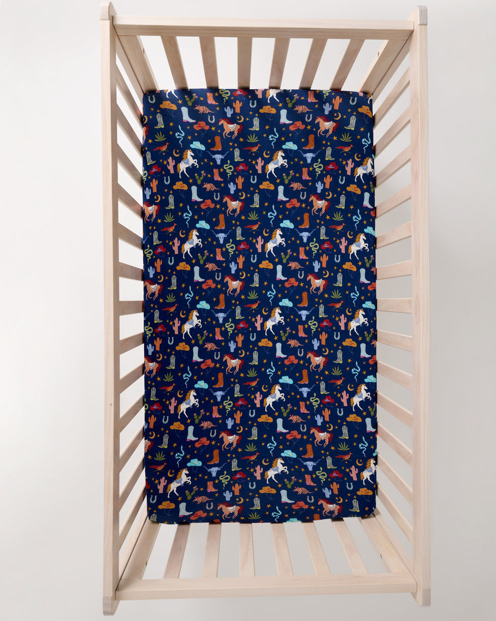 Overhead view of the Blue Rancher Roundup Fitted Crib Sheet