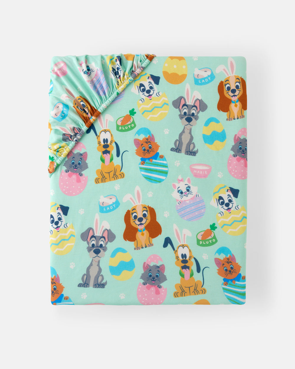 Flat lay of the Disney Peekaboo Pets Fitted Crib Sheet