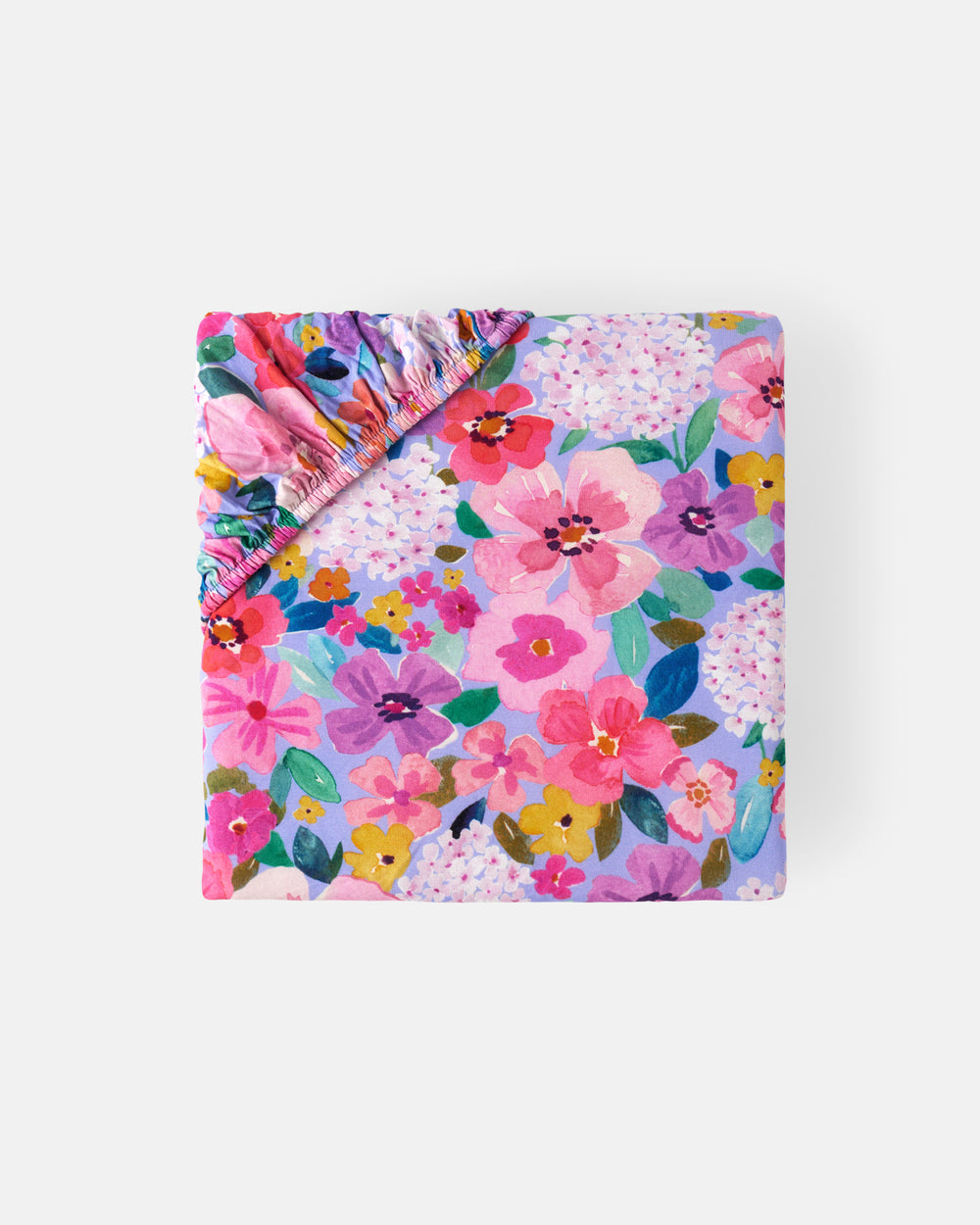 Flat lay of the mini Sweet Sprigs Fitted Crib Sheet
