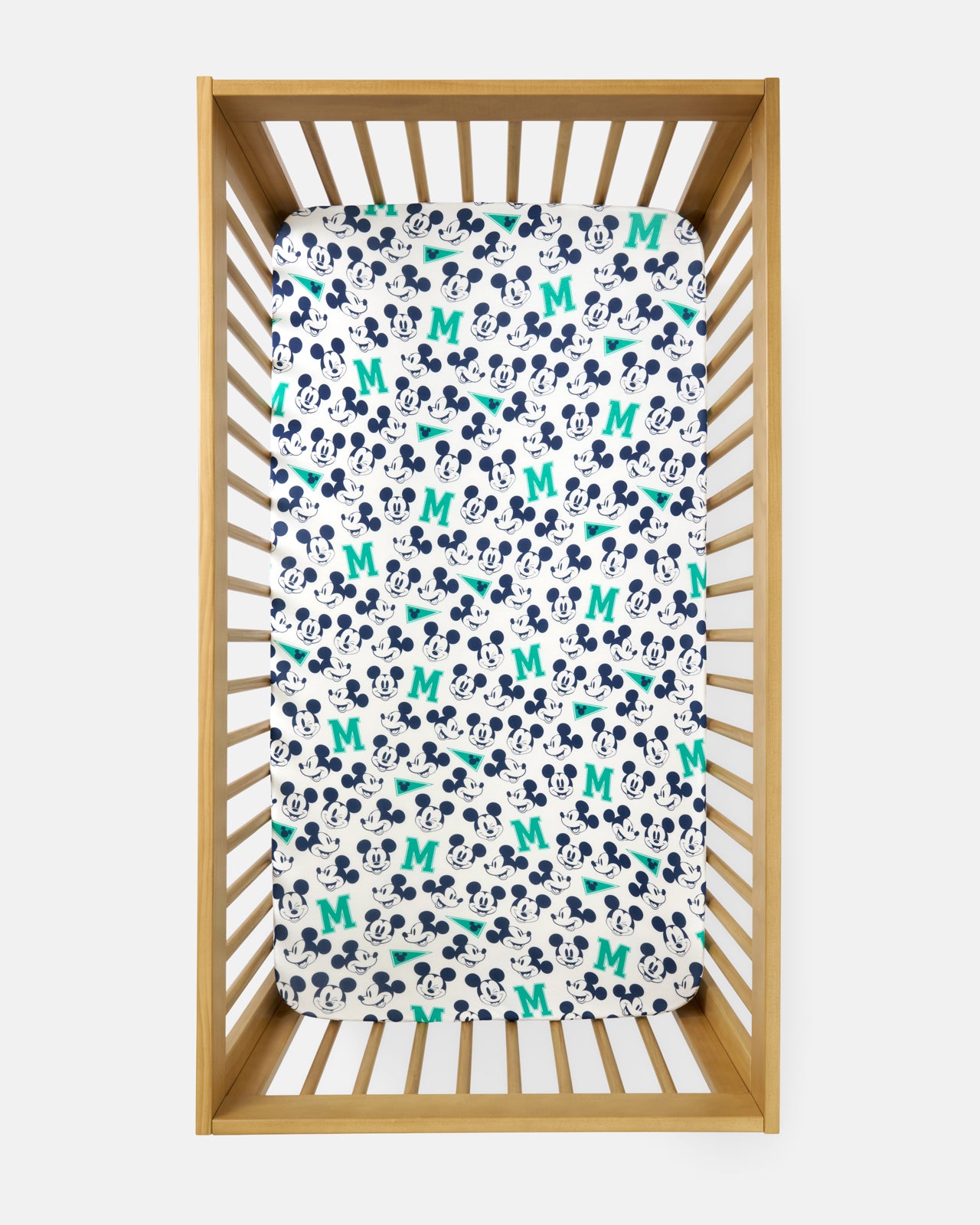 Flat lay of the Disney Varsity Mickey Mouse Fitted Crib Sheet