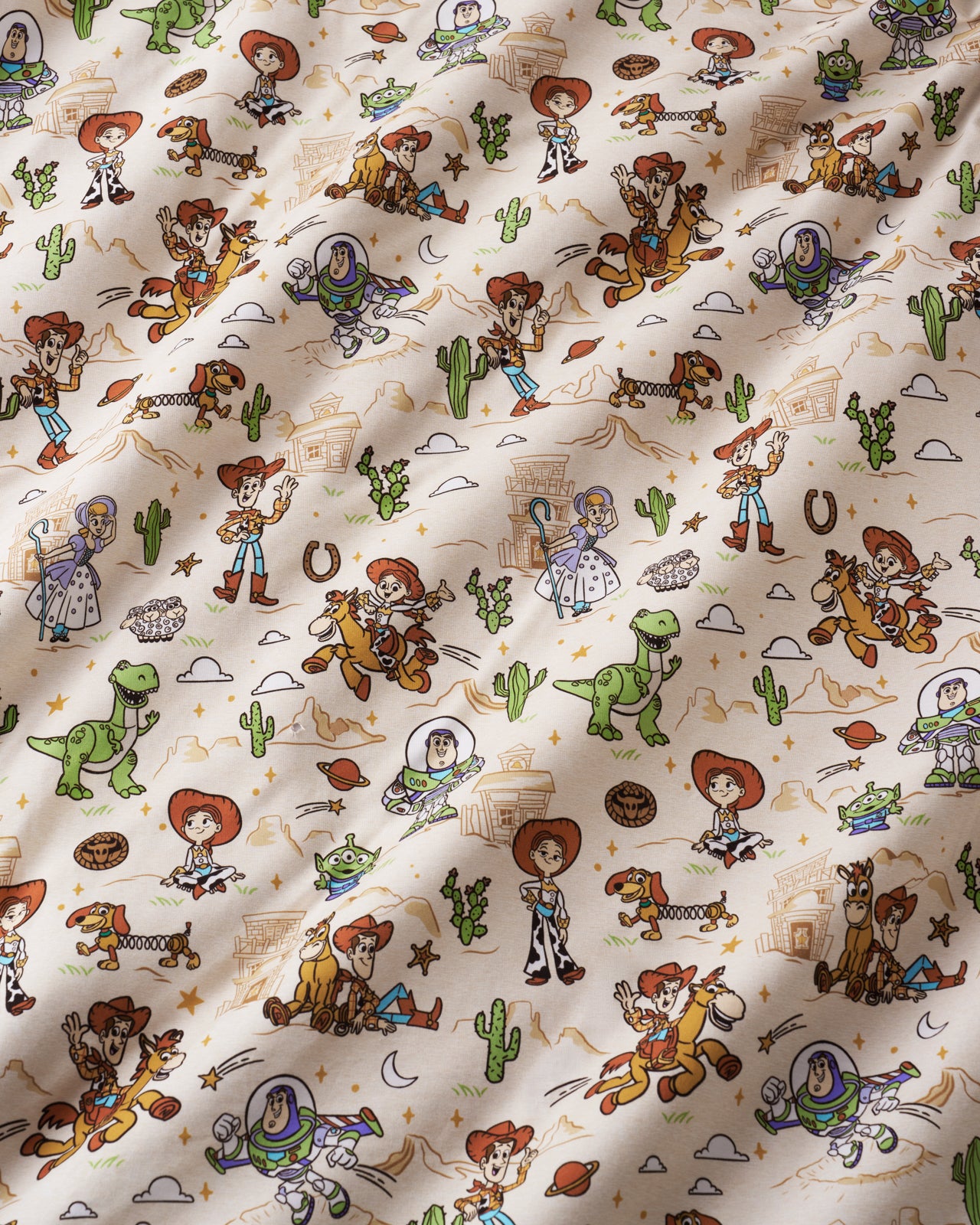 Close up of the Disney & Pixar Woody's Wild West fabric