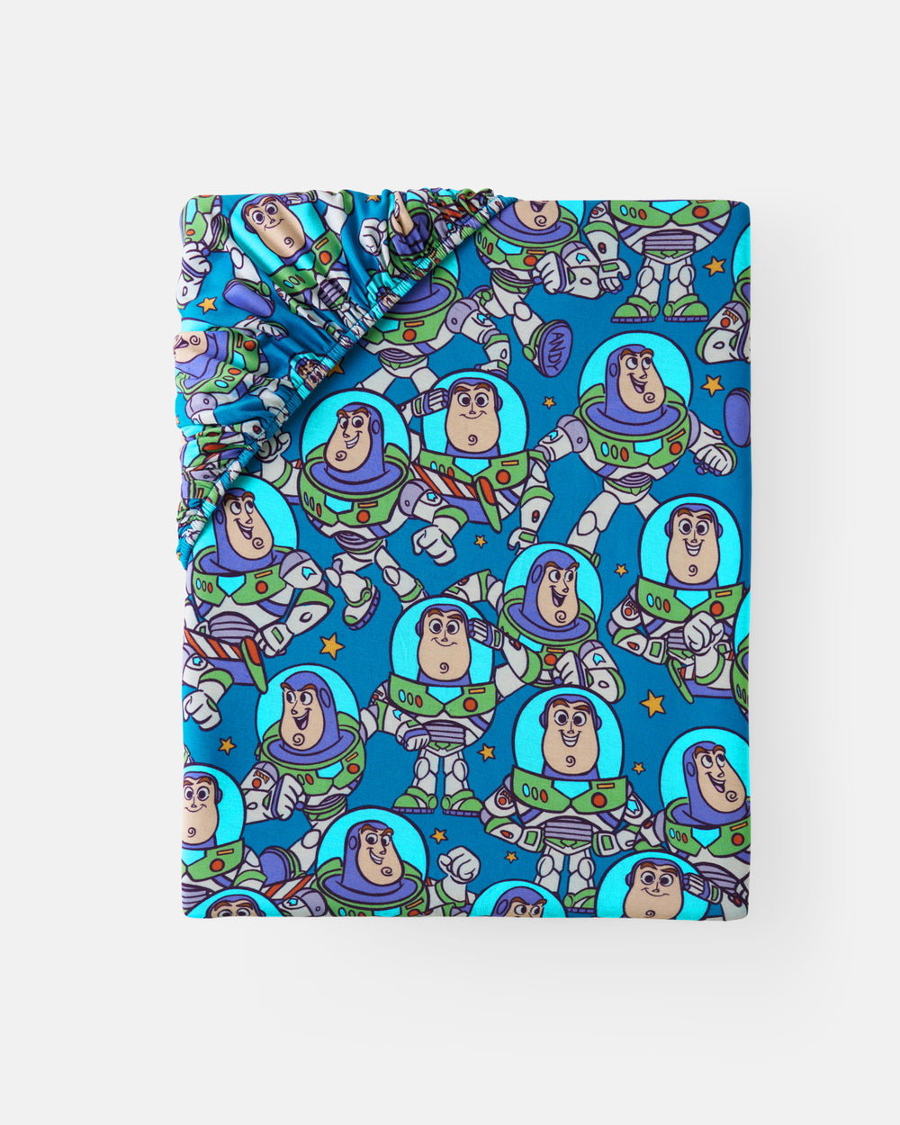 Flat lay of the Disney & Pixar Buzz's Cosmic Crew Fitted Crib Sheet