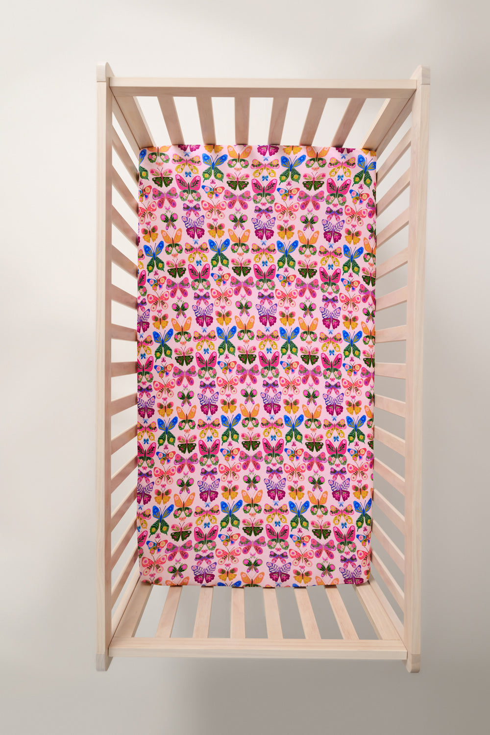 Overhead view of the Flutter Garden Fitted Crib Sheet