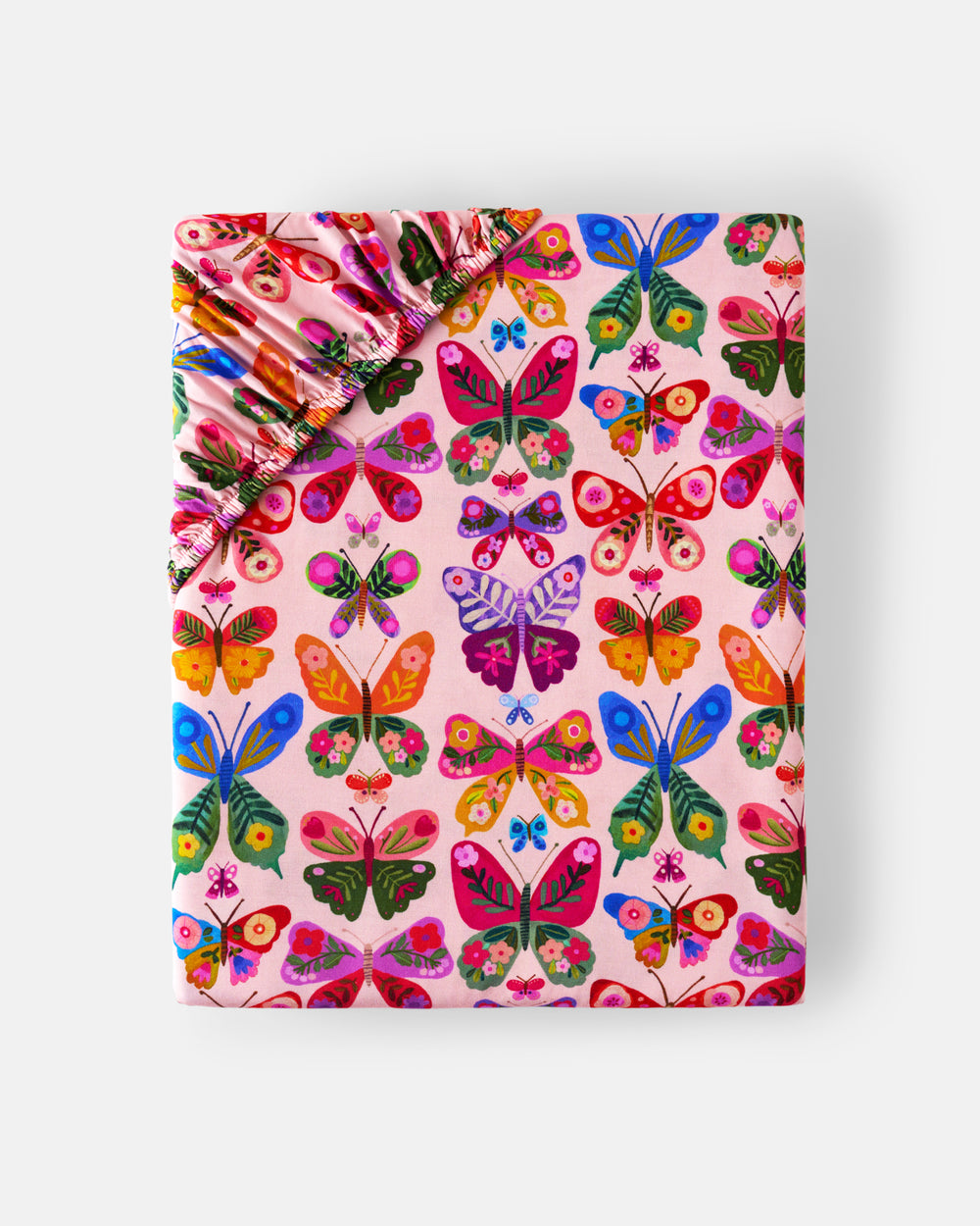 Flat lay of the standard Flutter Garden Fitted Crib Sheet