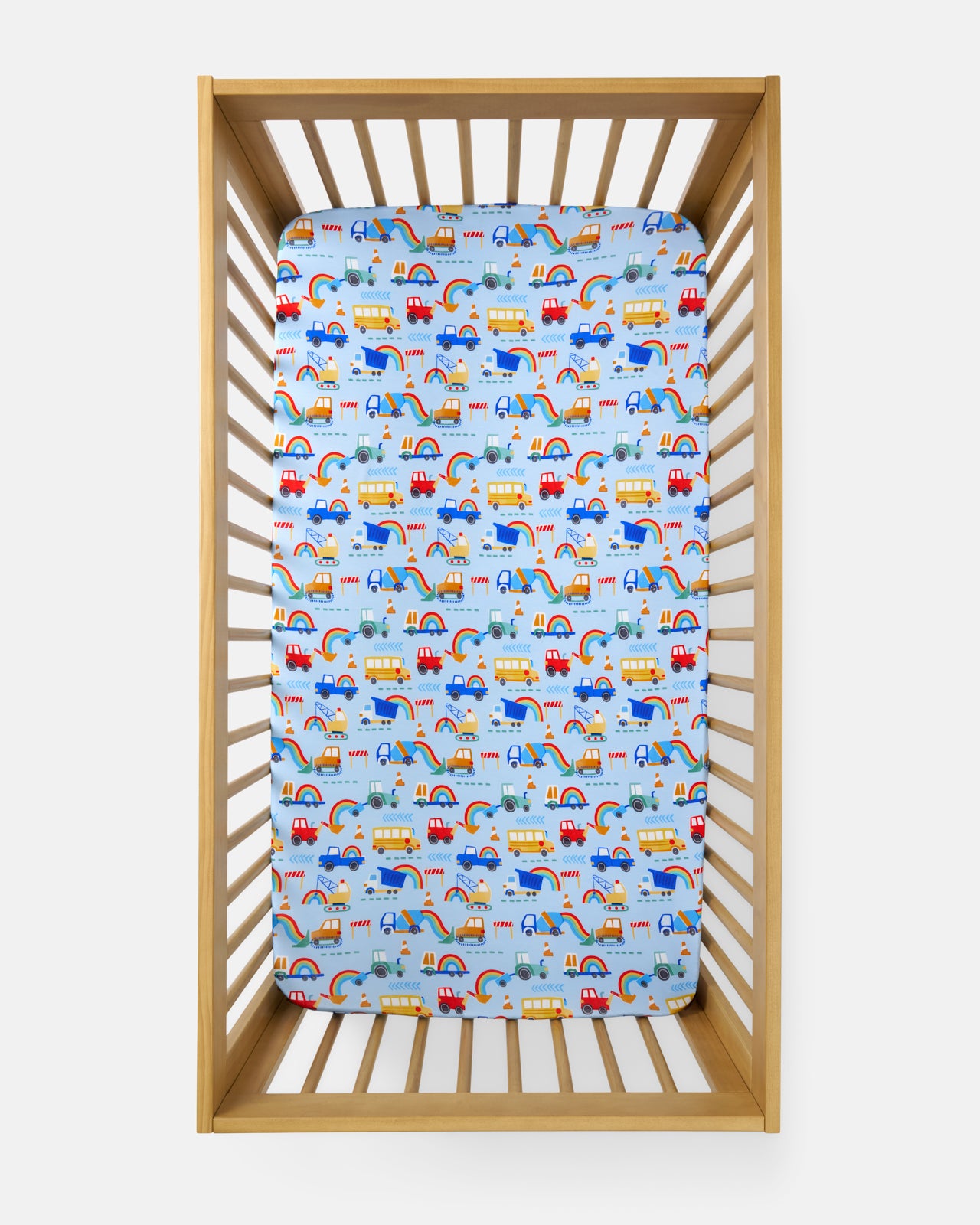 Overhead view of the Rainbow Trucks Fitted Crib Sheet