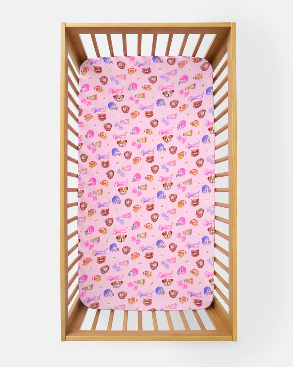 Overhead view of the Team Spirit Pink Fitted Crib Sheet