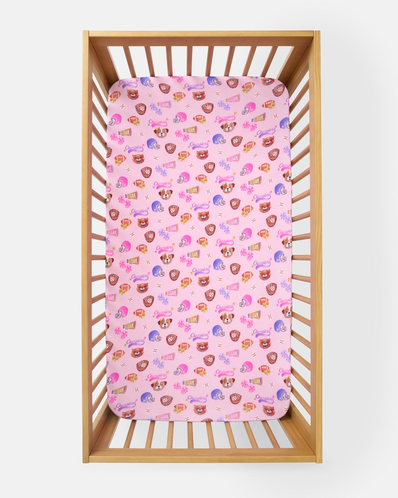 Overhead view of the Team Spirit Pink Fitted Crib Sheet