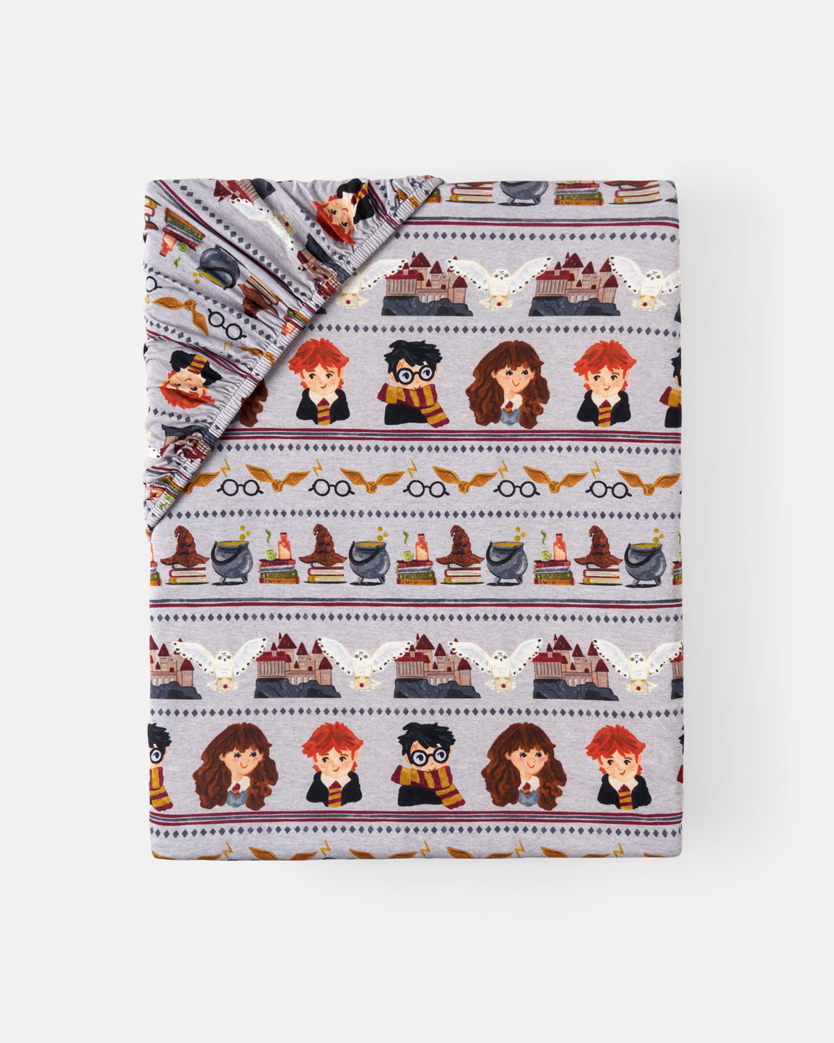 Flat lay of the Harry Potter™ Spellbinding Studies Fitted Crib Sheet