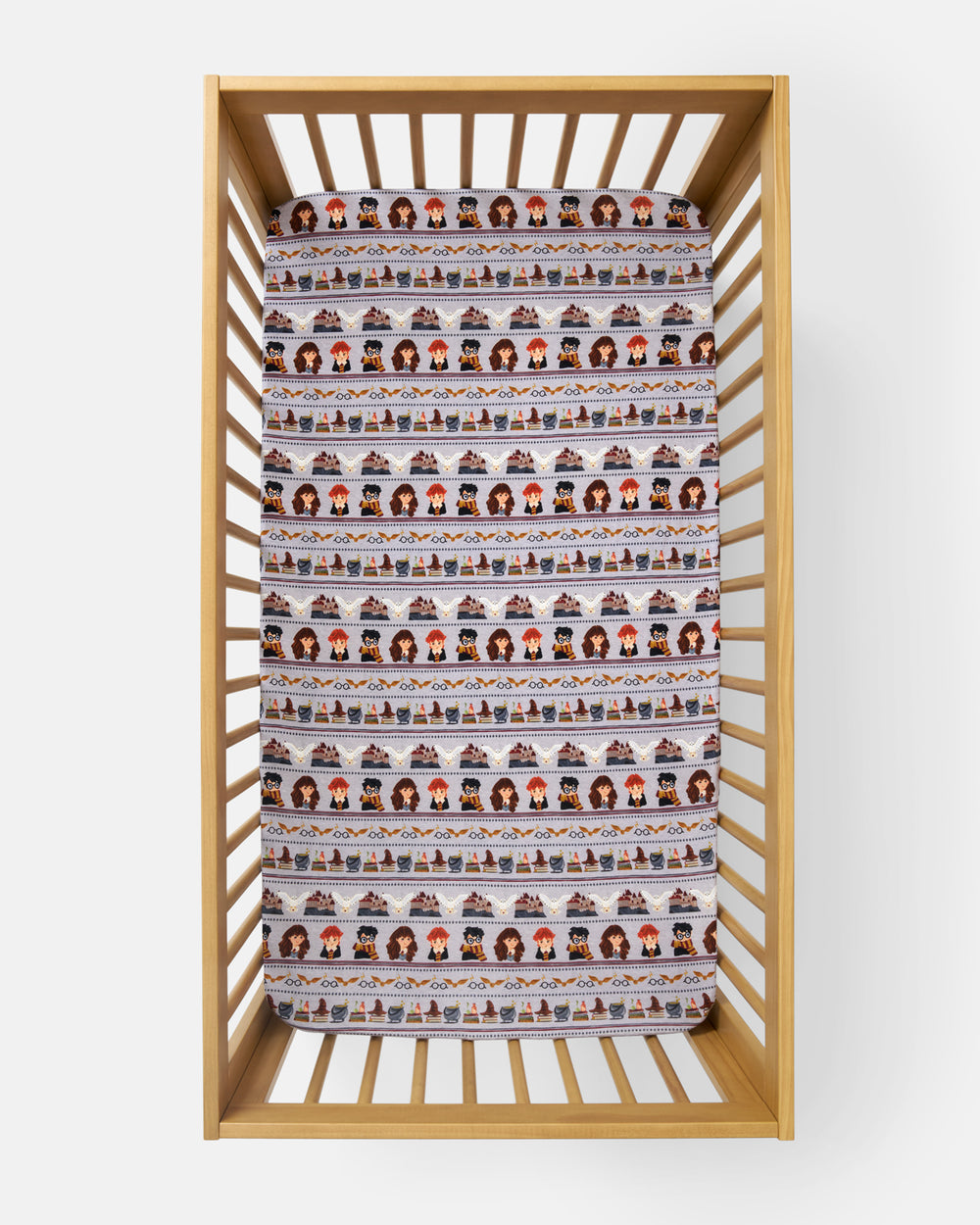 Aerial view of the Harry Potter™ Spellbinding Studies Fitted Crib Sheet