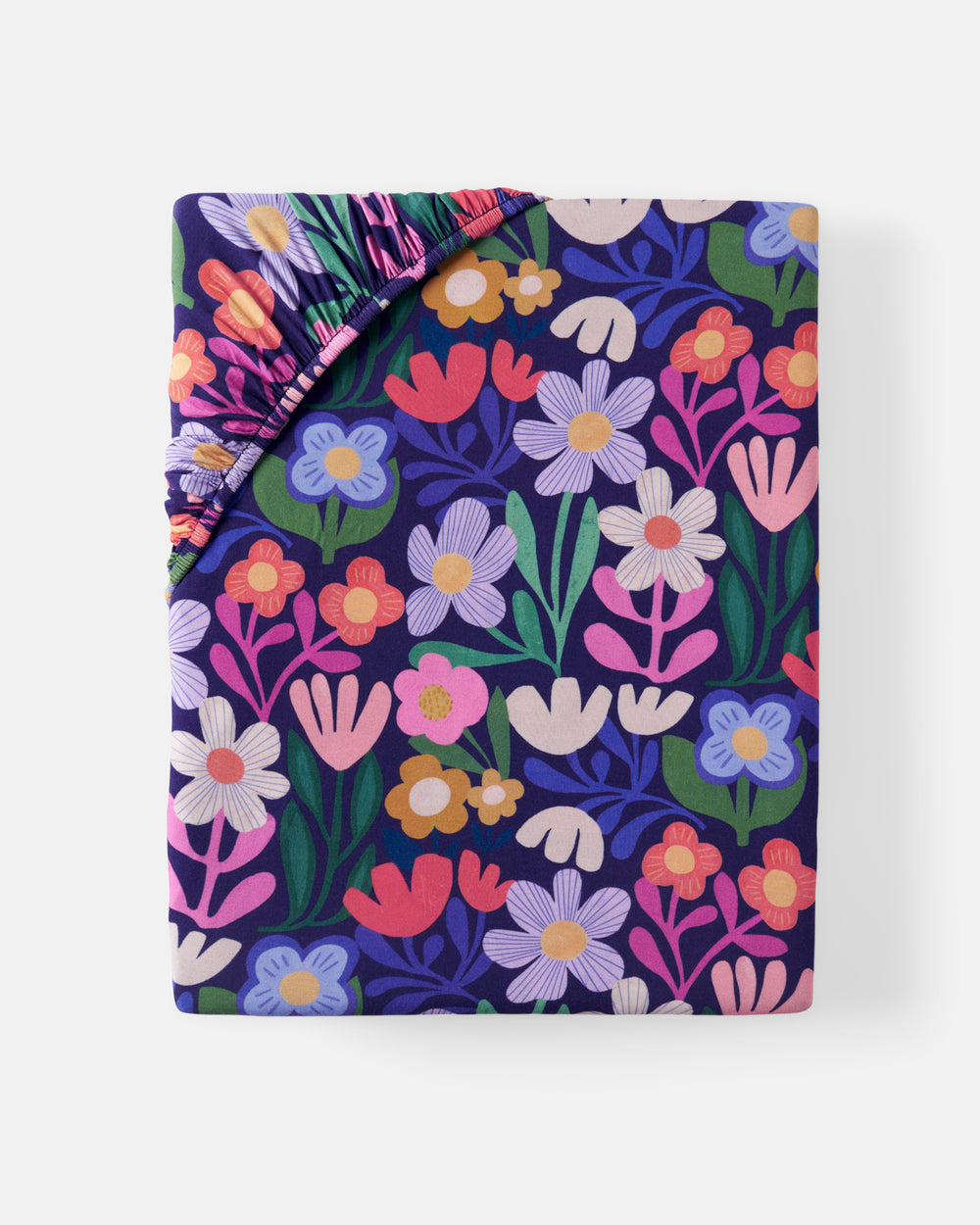Flat lay of the Wild Garden Fitted Crib Sheet