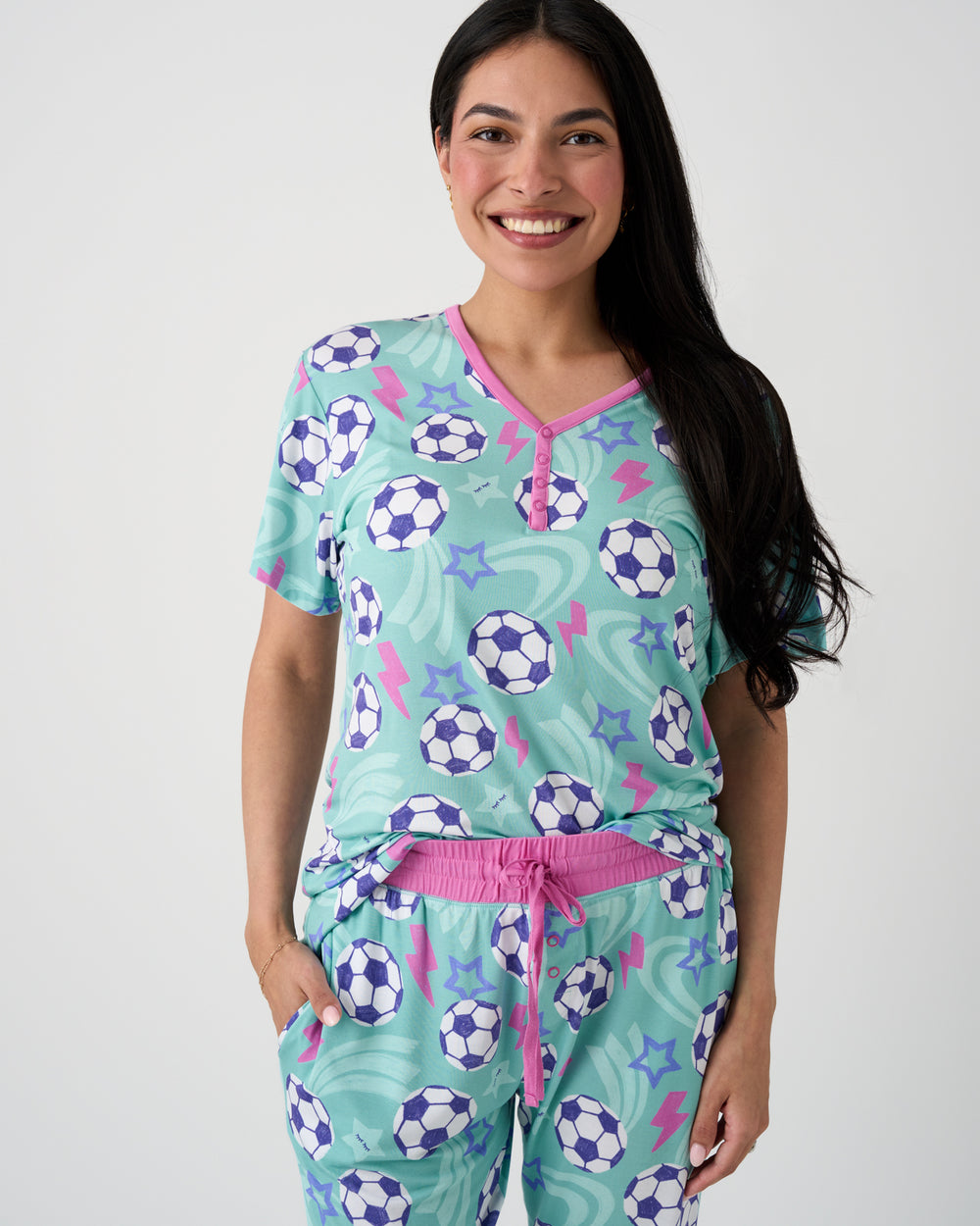 Woman wearing the Aqua Soccer Stars Women's Short Sleeve Pajama Top