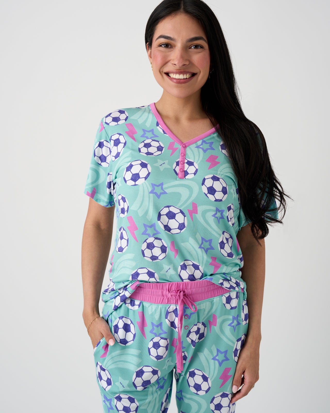 Woman wearing the Aqua Soccer Stars Women's Short Sleeve Pajama Top