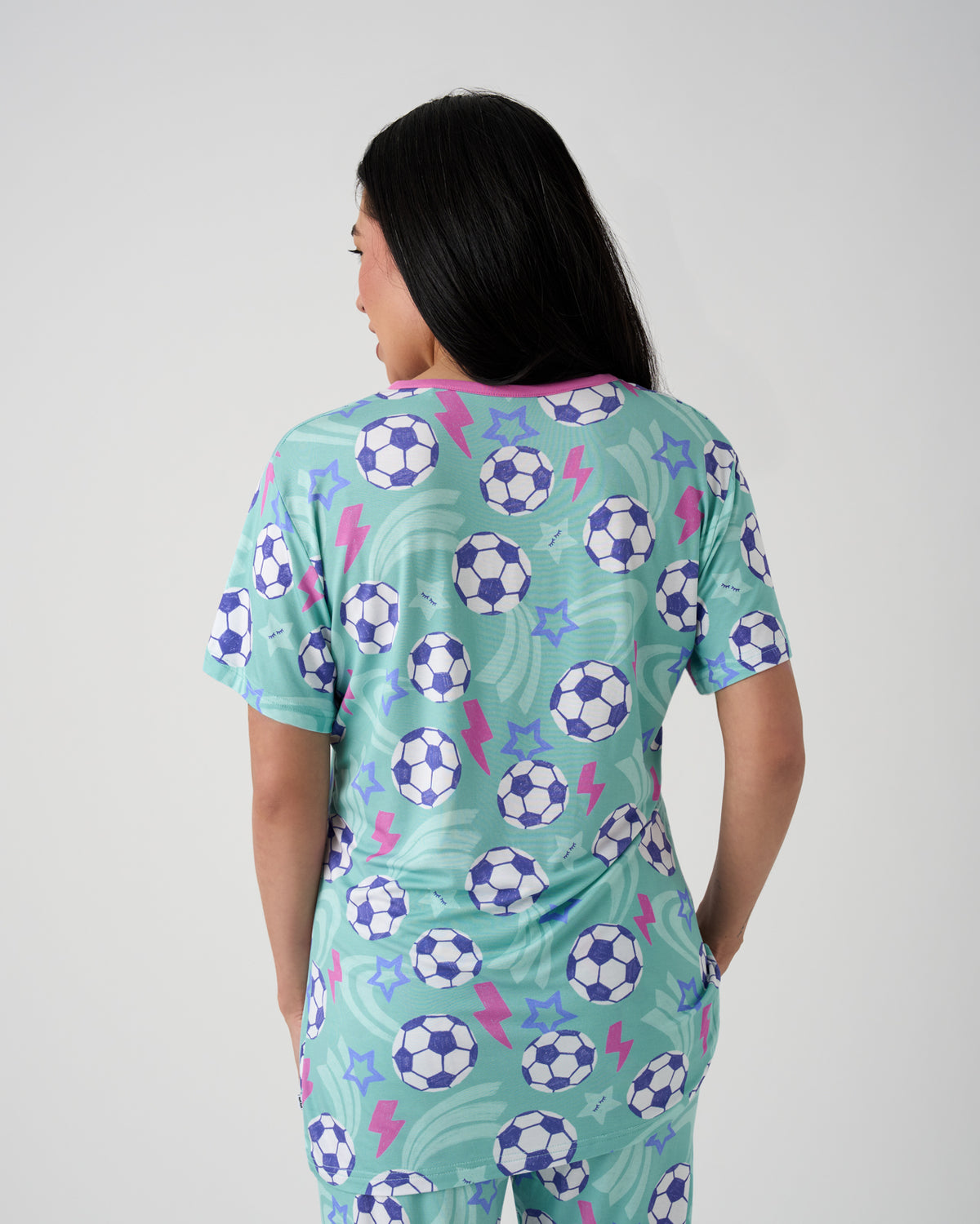 Back view of woman wearing the Aqua Soccer Stars Women's Short Sleeve Pajama Top