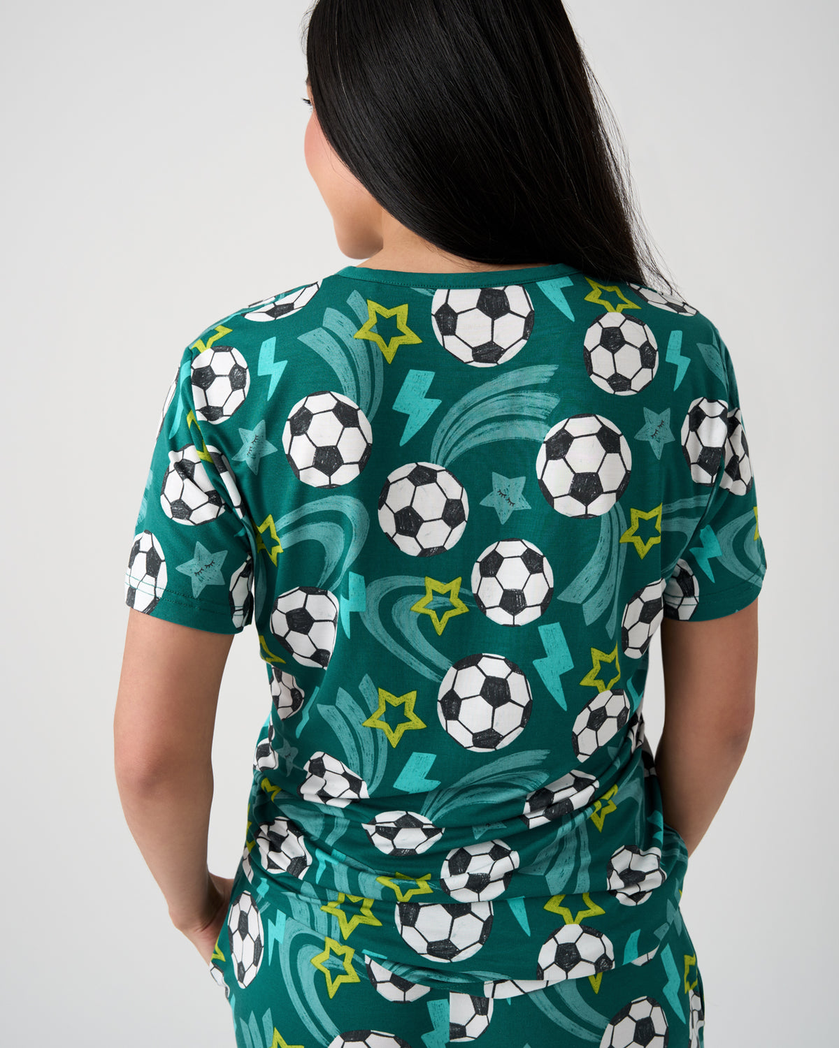 Back view of woman wearing the Soccer Stars Women's Short Sleeve Pajama Top