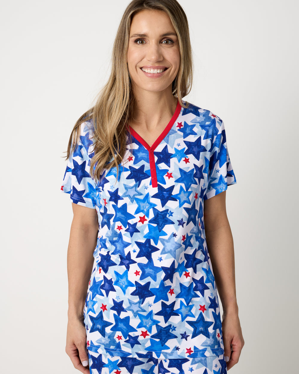 Woman wearing the Starry Splash Women's Short Sleeve Pajama Top