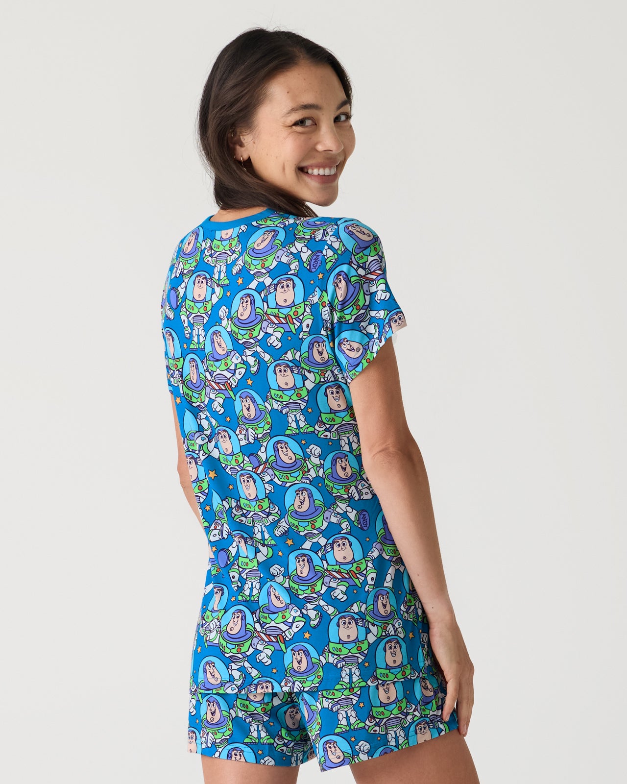 Back view of woman wearing the Disney & Pixar Buzz's Cosmic Crew Women's Short Sleeve Pajama Top