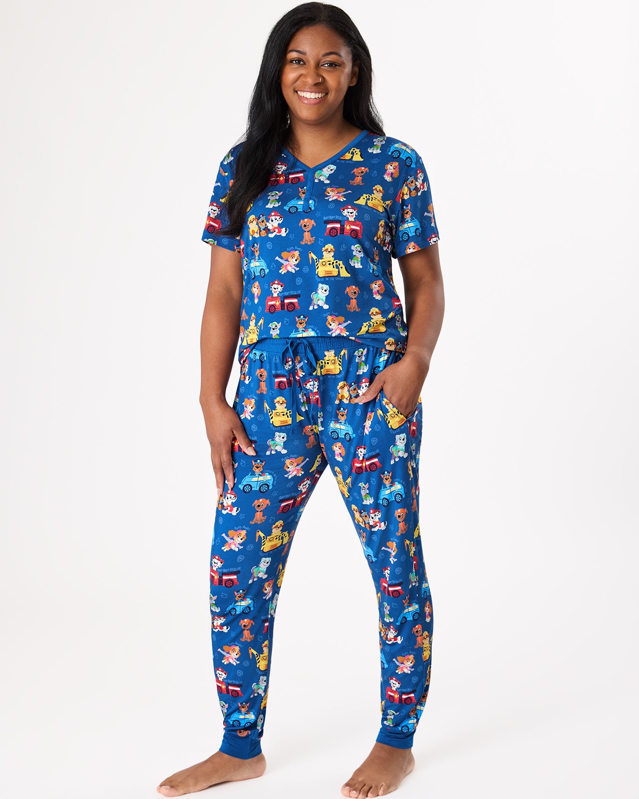 Woman wearing the PAW Patrol Adventure Bay Heroes Women's Short Sleeve Pajama Top and Pants